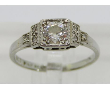 Art Deco 18ct white gold platinum set diamond ring, principal stone 0.25ct approx, with further diamond set stepped shoulders