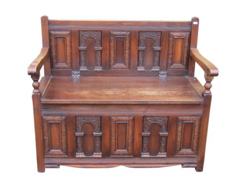 A small reproduction oak monk’s bench, 80 cm high, 97 x 48 cm