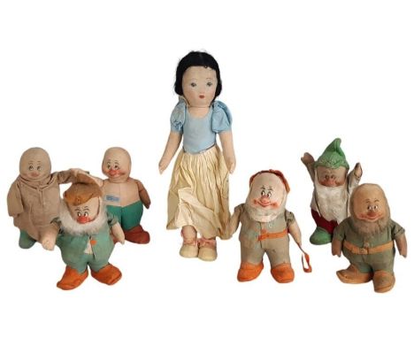 A collection of Snow White and various Dwarves by Chad Valley circa 1938, all with makers label, some clothing missing. Snow 
