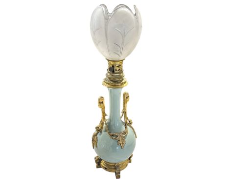 A good 19th century ormolu mounted celadon porcelain vase lamp with frosted petal shaped shade, the base fitted with a key-wo