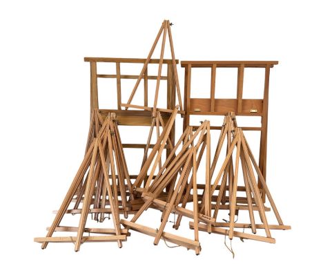 A group of art display easels and racks, to include: 22 Jackson's easels, height 53 cm; with a Jackson's print rack and one o