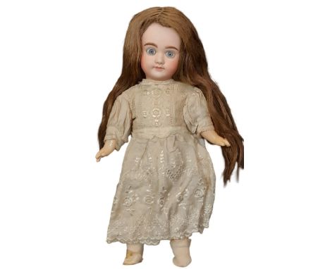 Small French bisque head Bebe doll by Lanternier 1915-1924 with fixed blue eyes, painted lashes and brows, closed mouth, pier
