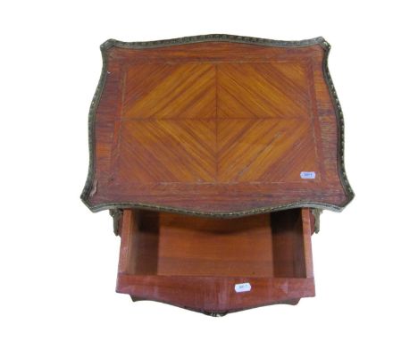 A French kingwood side/lamp table with frieze drawer and serpentine outline with applied metal mounts 70 cm high x 44 cm x 36