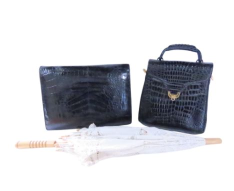 A Genghiz K black faux crocodile handbag (lacks strap) together with a black crocodile clutch handbag (lacks strap) and a whi