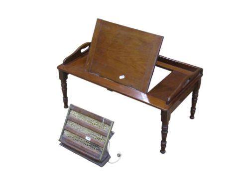 An Edwardian mahogany clerks/reading twin handled tray with adjustable easel insert tops, with applied badge “Leveson &amp; S
