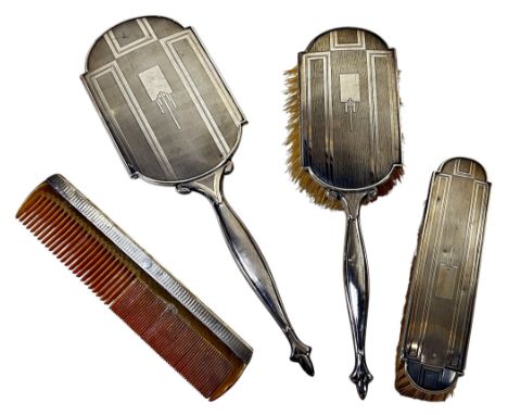 A cased Art Deco silver vanity set with a hair brush, clothes brush, mirror and comb, Birmingham 1935, maker Charles S Green 