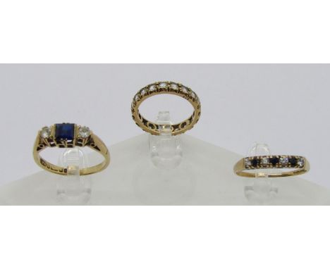 Three vintage 9ct gem set rings to include a three stone example set with a square-cut sapphire, 6.4g total