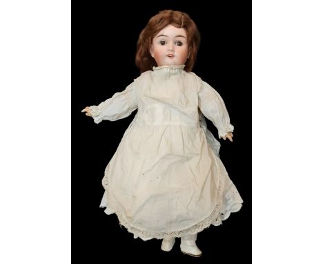 An early 20th century bisque head German 'Bebe Elite' doll by Max Handwerck with brown closing eyes, jointed composition body