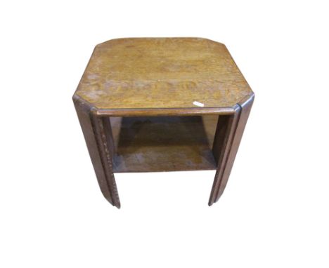 A small limed oak two tier occasional table in the Art Deco style, 44 cm high, 45 x 46 cm