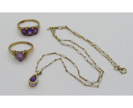 Group of 9ct amethyst set jewellery; a three stone ring, size L/M, a heart-cut ring, size K/L and pear-cut pendant necklace, 
