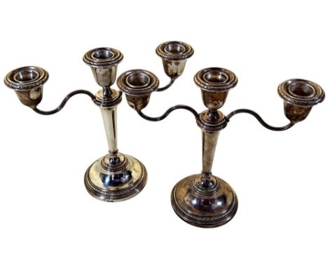 A pair of silver three sconce candlesticks (can be converted to single sconce), Birmingham 1959, maker Adie Brothers Ltd, 20c
