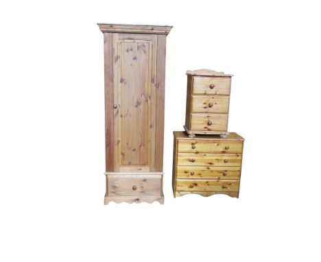 An associated pine bedroom suite comprising a single wardrobe, chest of four drawers and a three drawer bedside chest (3)