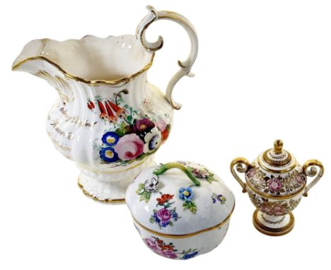 A Dresden quatrefoil shaped bowl and cover with hand-painted floral detail, a Coalport moulded jug with floral panels dated 1