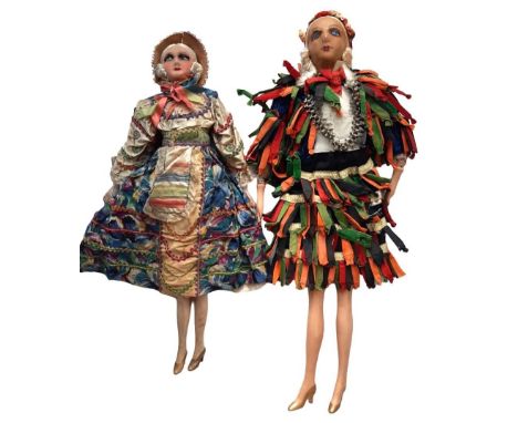 Two 1920's  boudoir dolls with soft body and ceramic lower limbs, the larger having a composition head with painted features 