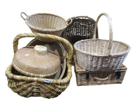 A group of vintage wicker baskets, hamper, etc