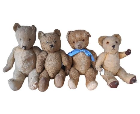 Four vintage teddy bears all with jointed body,  stitched mouth and nose and original paw pads. Heights 50, 45, 42, 39cm. Pla
