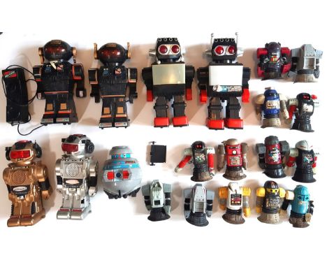 A collection of 1980's robot toys including 2 Saturn Robots by Kamco, 2 x Magic Mike in gold and silver, a Talk-A-Tron robot 