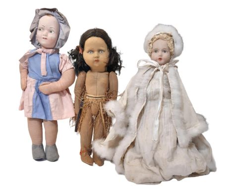Three vintage soft bodied dolls comprising a 1930's curly haired girl doll by Chad Valley height 42cm, an ethnic doll wearing