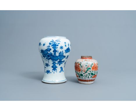 Full title: A Chinese blue and white 'antiquities' vase and a wucai jar with flowers and Buddhist lions, Transitional period 