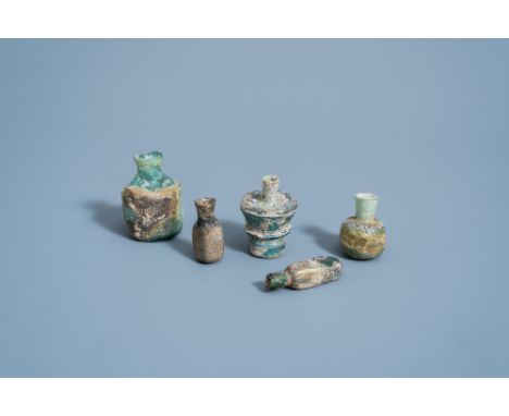 Full title: Five various soda glass bottles, jars and flasks, Roman periodDescription: H 6,3 - 4,4 cm (the tallest and the sm
