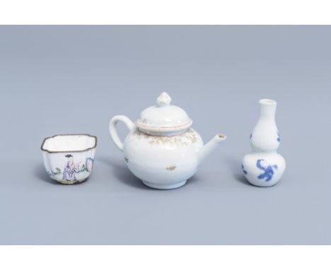 Full title: A Chinese gilt miniature teapot, a Canton enamel cup and a blue and white doll's house miniature vase with boys, 