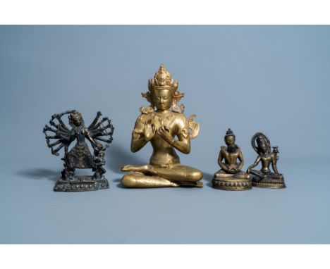Full title: Four various Sino-Tibetan brass and copper figures, 20th C.Description: H 40,7 - 16,7 cm (the tallest and the sma
