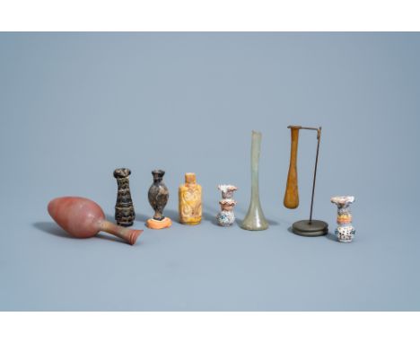 Full title: A varied collection of glass bottles and flasks, possibly RomanDescription: H 14,4 - 5,8 cm (the tallest and the 