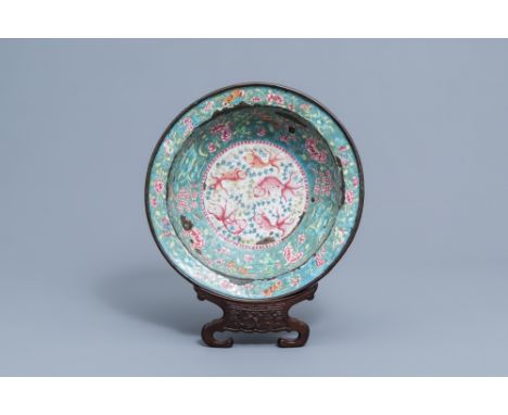 Full title: A Chinese Canton enamel bowl with fish and floral design, 19th C.Description: H 10 cm - Dia.: 37 cm 