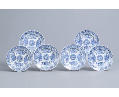 Full title: Six Chinese blue and white dishes with floral design and raised central medallion, Kangxi/YongzhengDescription: D