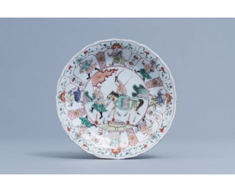 Full title: A Chinese lotus shaped famille verte 'Mu Guiying' dish, KangxiDescription: Dia.: 21,8 cm   Ref.:- Groninger Museu