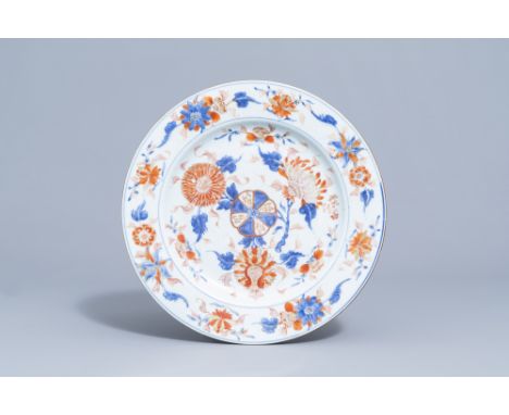 Full title: A Chinese Imari style charger with floral design, KangxiDescription: Dia:. 33,2cm