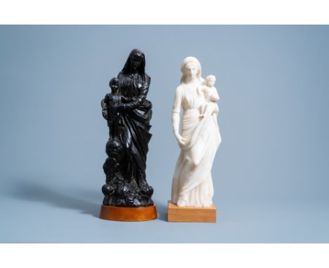 Full title: Two Virgin and Child groups in wood and alabaster, one signed K. Van Zundert, 19th/20th C.Description: H 47,8 - 4