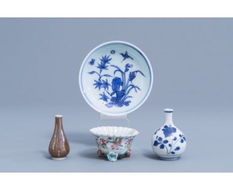 Full title: A Chinese blue and white saucer with floral design, a famille rose cup with relief design and two doll's house mi