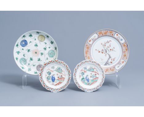 Full title: Four various Chinese famille verte and Imari style plates with floral design and a figure in a landscape, KangxiD