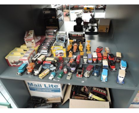 A shelf of mixed vintage diecasts including Lesney, Husky, Trackside, Oxford etc, mainly modern, half boxed