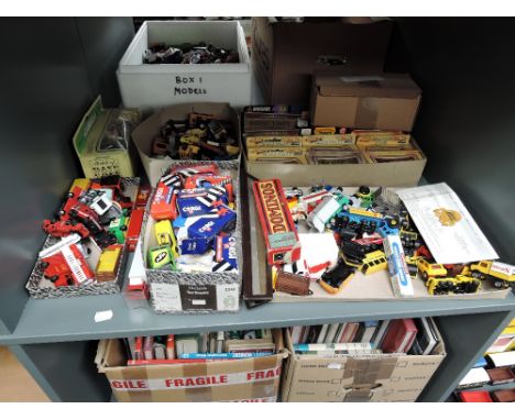 A shelf of 1980's and later diecasts including Corgi, Lledo Days Gone and similar, boxed and loose