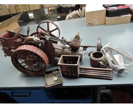 A part hand built Live Steam Traction Engine having 20cm diameter rear wheels, single piston horizontal engine, many parts se