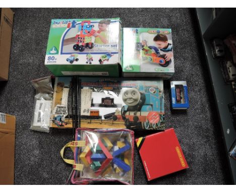 A Early Learning Centre Build It Starter Set and Mini Vehicle, both boxed, a Wedgits Building Block Set in original bag, a Ho