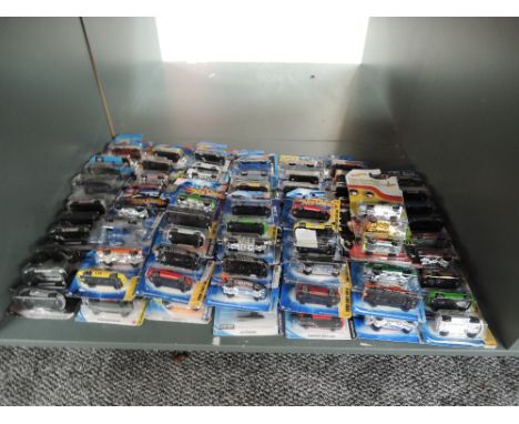 A shelf of 21st century Mattel Hotwheels diecasts, all in blister packs, approx 95