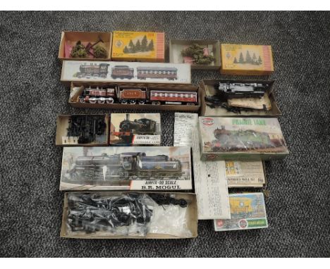 Four Airfix 00 scale plastic kits, 0-4-0 Saddle Tank, BR Mogul, Cement Wagon, Prairie Tank (part made) along with two Faller 