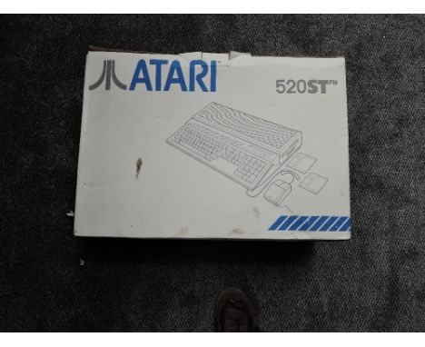 An Atari 520ST Computer Keyboard with Mouse, leads and manual, with inner polystyrene packaging and original box