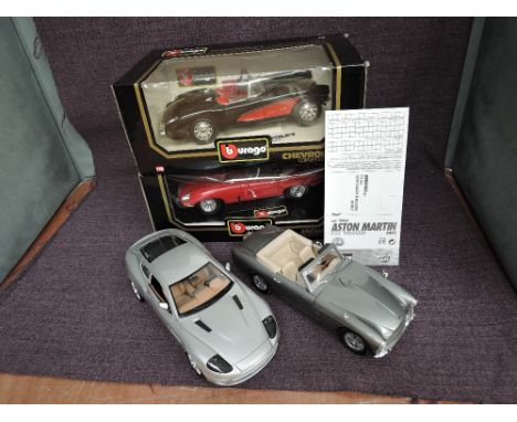 Four 1:18 scale diecasts, Burago 3034 Chevrolet Corvette 1957 and 3016 Jaguar E Cabriolet 1961, both boxed along with a John 