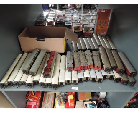 A shelf of Hornby, Hornby Dublo and similar 00 carriages and Caboose's, approx 40, various condition and repair