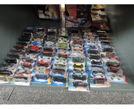 A shelf of 21st century Mattel Hot Wheels diecasts, mainly 2006 onwards, all in blister packs, approx 80
CONDITION REPORT
App