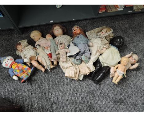 A shelf of mid 20th century and later Dolls including Composition Dee and Cee and two similar, Celluloid Pedigree Black Walki