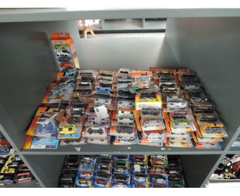 A shelf of 21st century Matchbox diecasts including Aeroplanes, all in blister packs, appprox 140