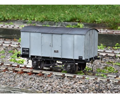 A 5 inch gauge LMS 7 ton Gunpower railway van No M701089, finished in British Railways period light grey livery with etched s