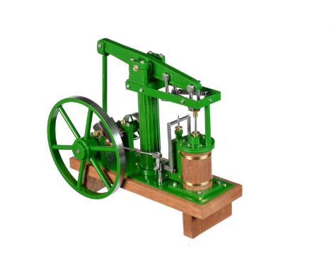 A freelance model of a live steam beam engine, built by Mr D Russell of Frazerburgh. The beam supported on reeded central col