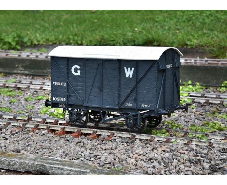 A well built 5 inch gauge 12 ton ventilated railway wagon No 105149, finished in dark grey livery with riveted angle iron, sp