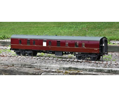 A well built 5 inch gauge British Railways BG open guards van in maroon livery with coaching stock crest. A 57 foot BG was of
